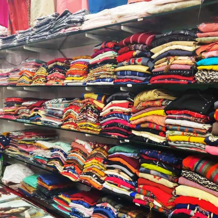 Bazaar,Market,Outlet store,Footwear,Textile,Fashion accessory,Marketplace,Retail,T-shirt,Collection