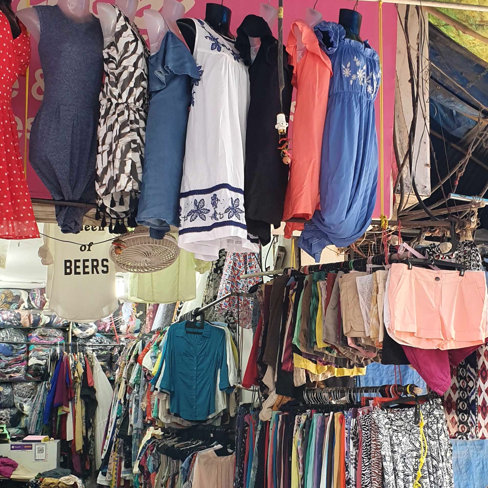 Selling,Clothing,Boutique,Bazaar,Public space,Human settlement,Market,Fashion,Textile,Room