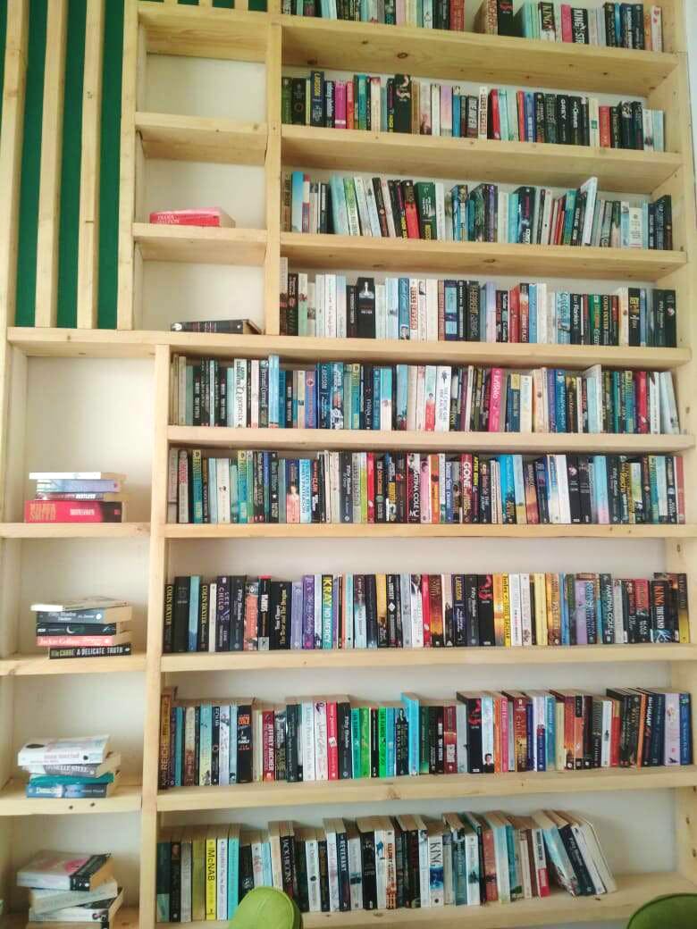 Shelving,Bookcase,Shelf,Furniture,Book,Publication,Library,Building,Room,Collection