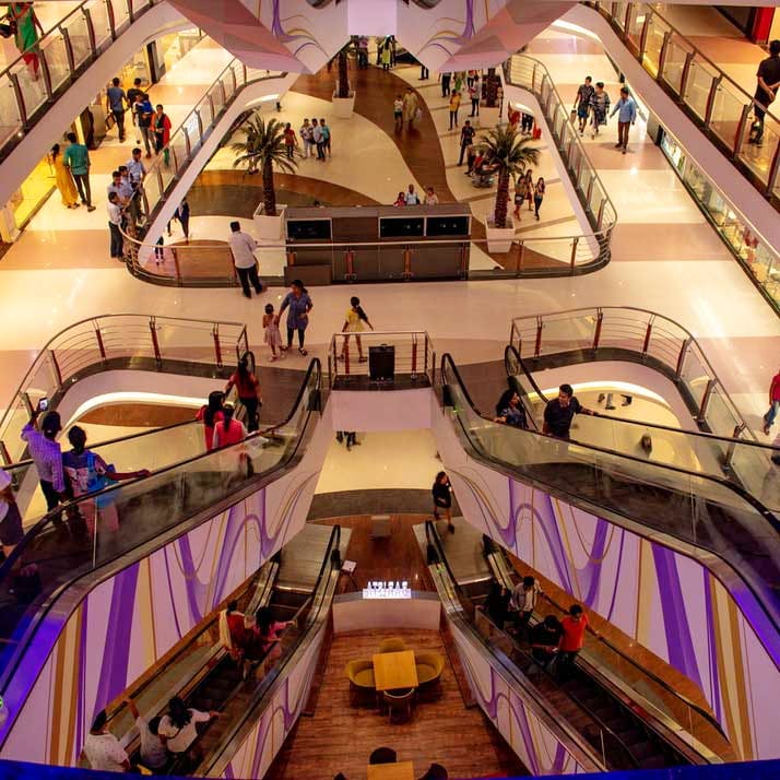 Escalator,Shopping mall,Building,Architecture,Retail,Stairs