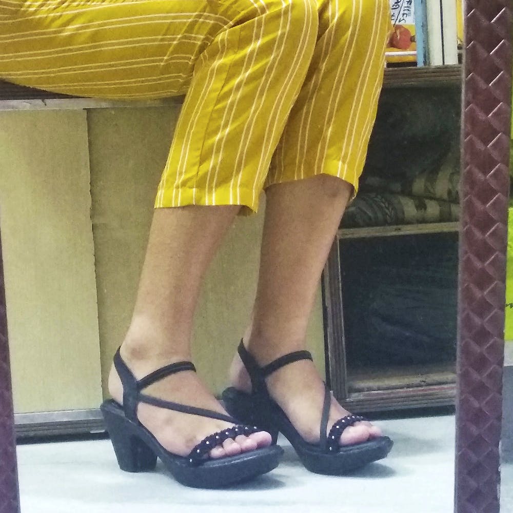 Footwear,Leg,Yellow,Human leg,Sandal,High heels,Shoe,Foot,Ankle,Fashion