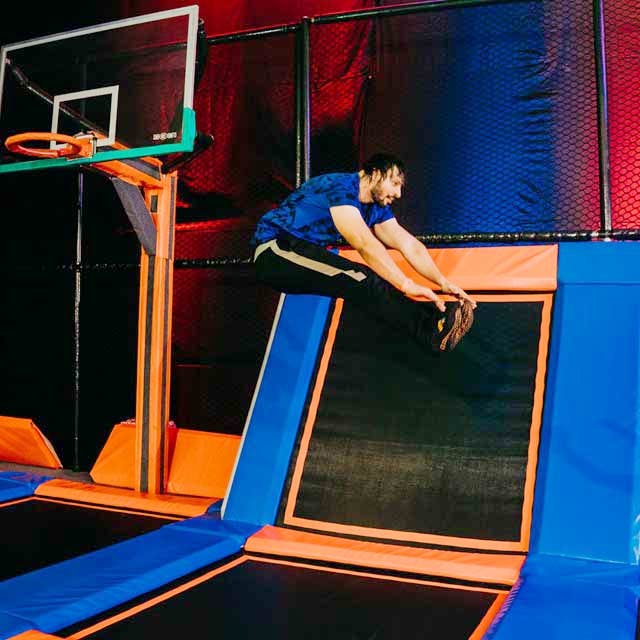 Flip (acrobatic),Performance,Gymnastics,Electric blue,Acrobatics,Trampolining,Trampolining--Equipment and supplies,Leisure,Sports equipment,Trampoline
