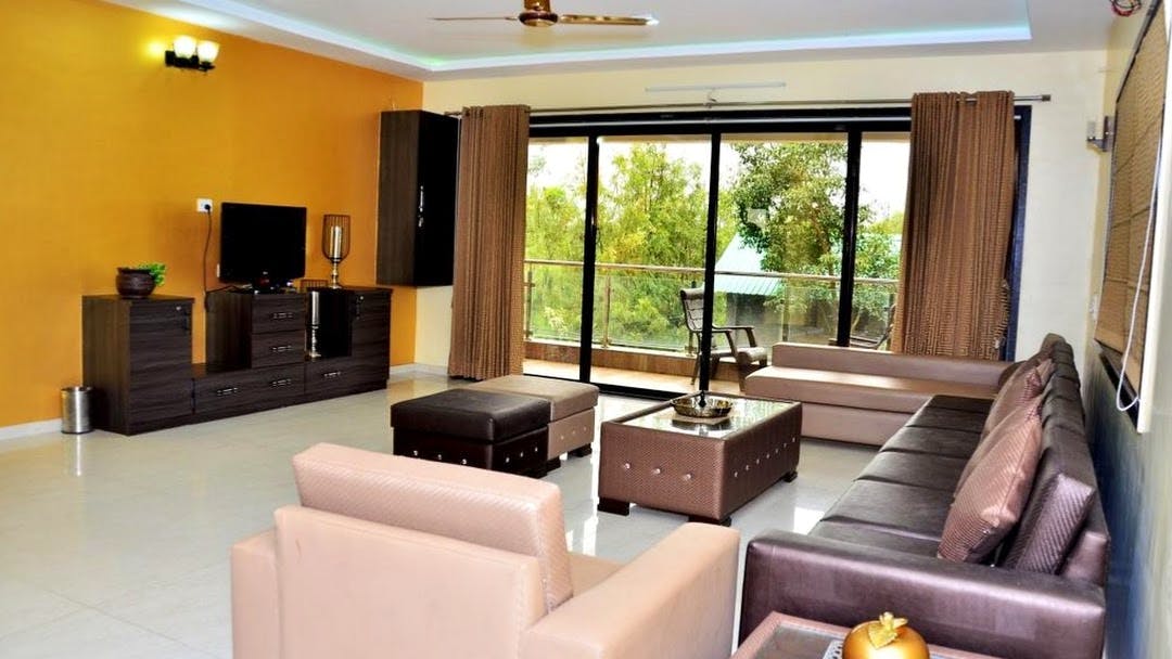 Living room,Room,Property,Interior design,Furniture,Building,Real estate,Home,House,Suite