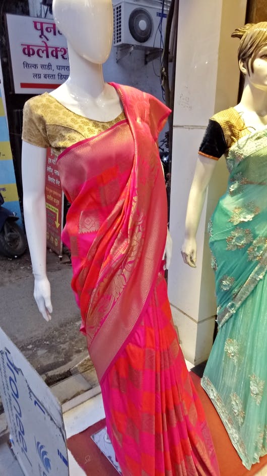 Clothing,Pink,Dress,Formal wear,Sari,Fashion design,Shoulder,Mannequin,Silk,Textile