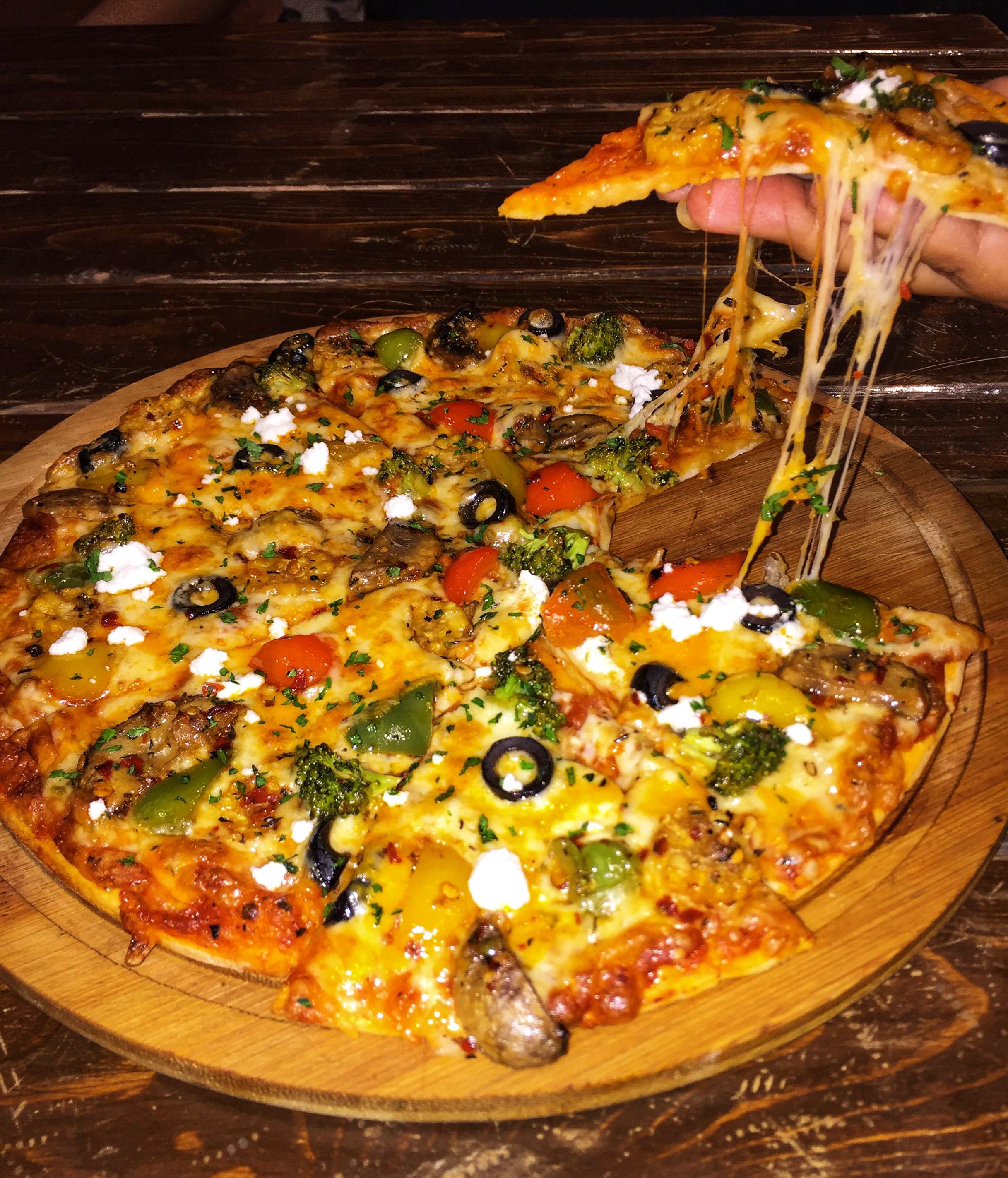 Dish,Food,Cuisine,Pizza,California-style pizza,Pizza cheese,Ingredient,Garnish,Italian food,Recipe