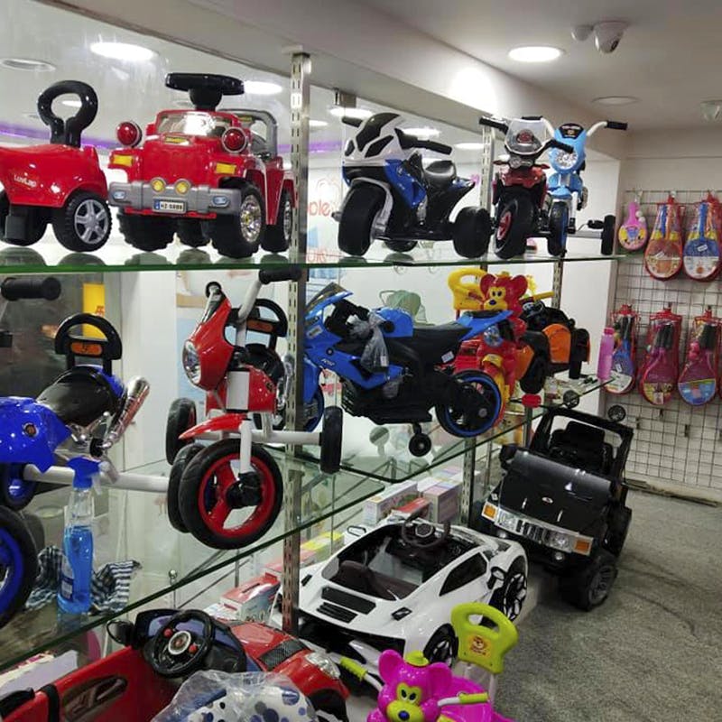 Vehicle,Footwear,Toy,Automotive design,Car,Collection,Room,Radio-controlled car,Helmet,Shoe