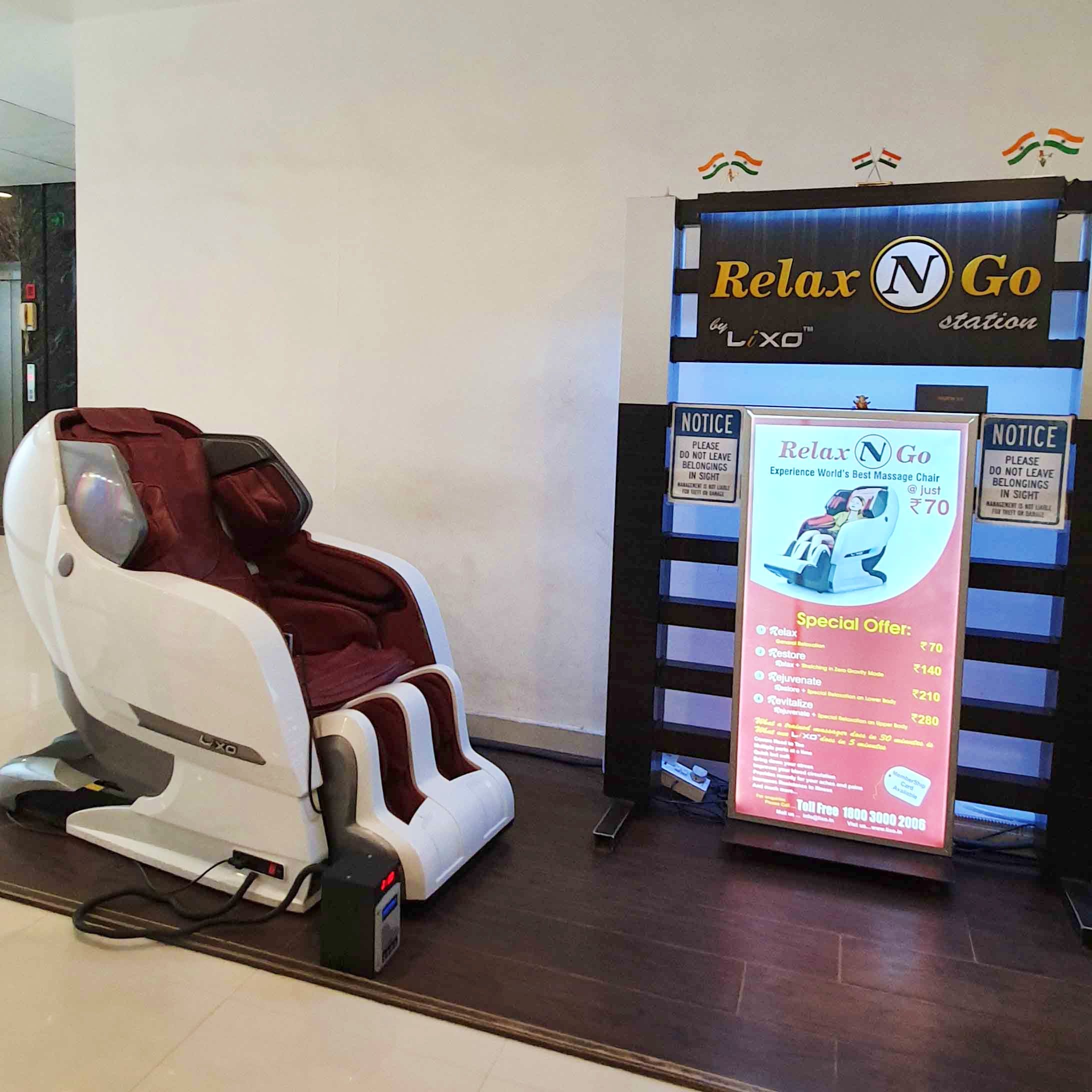 Massage chair,Product,Floor,Flooring,Room,Furniture,Chair,Wood,Personal care,Recliner