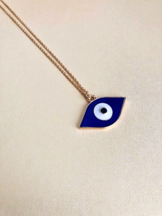 Pendant,Necklace,Cobalt blue,Jewellery,Fashion accessory,Locket,Chain,Body jewelry,Font,Silver