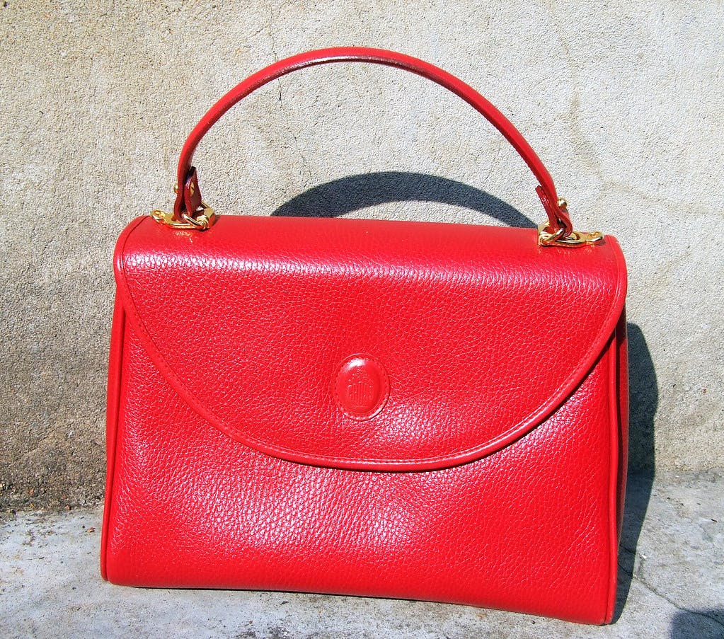 Handbag,Bag,Red,Leather,Fashion accessory,Product,Shoulder bag,Kelly bag,Fashion,Material property