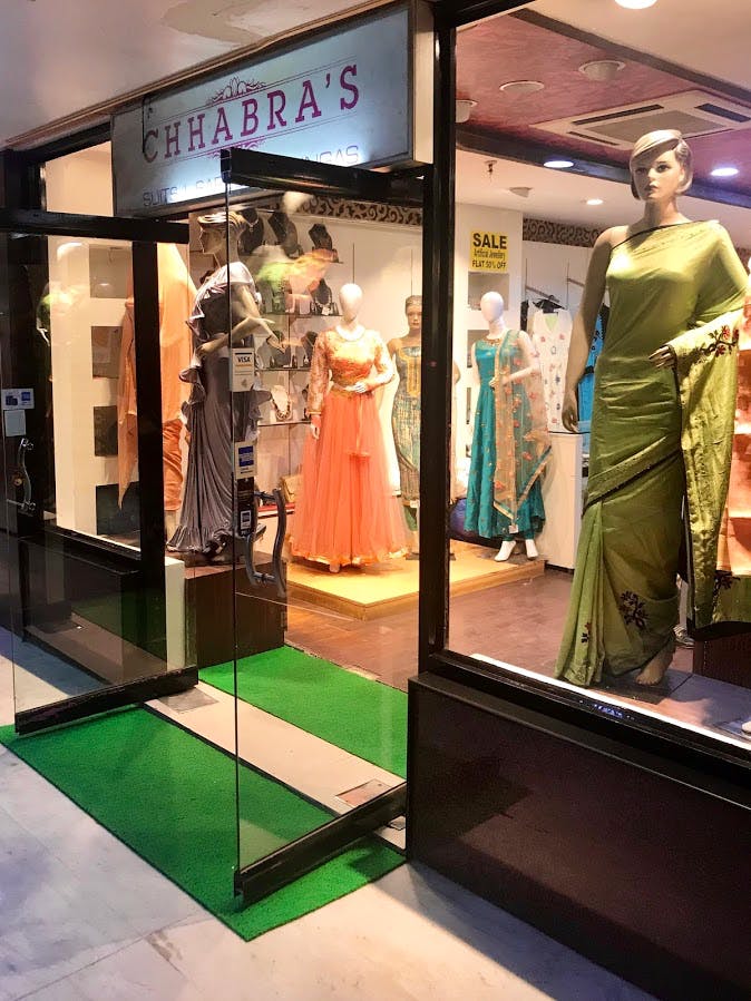 Boutique,Display case,Fashion,Display window,Dress,Retail,Outlet store,Building,Shopping mall,Collection