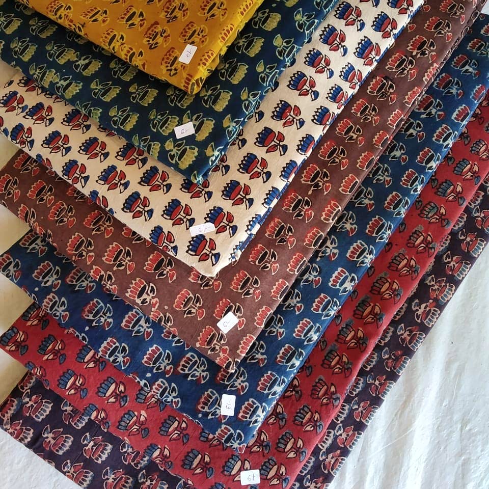 Textile,Brown,Pattern,Carpet,Maroon,Floor,Woven fabric,Pattern,Tablecloth,Flooring