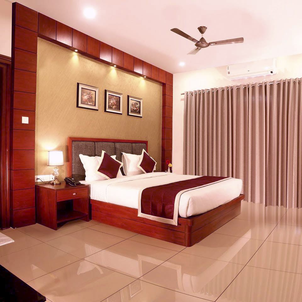 Bedroom,Room,Interior design,Furniture,Bed,Ceiling,Property,Wall,Bed frame,Bed sheet
