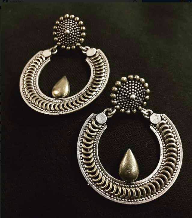 Jewellery,Fashion accessory,Earrings,Metal,Silver,Circle