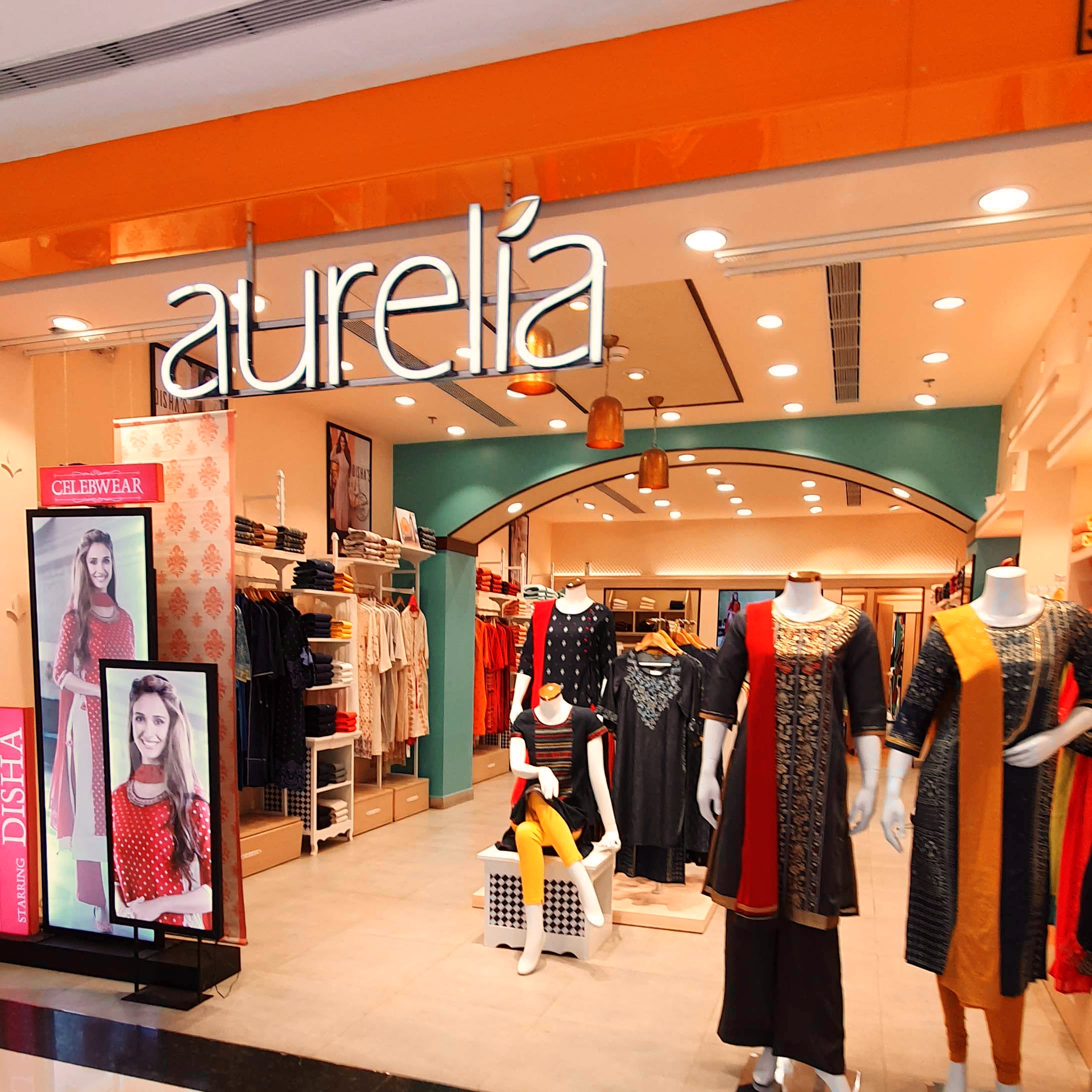 Boutique,Outlet store,Shopping mall,Building,Shopping,Fashion,Retail,Outerwear,Interior design,Display window