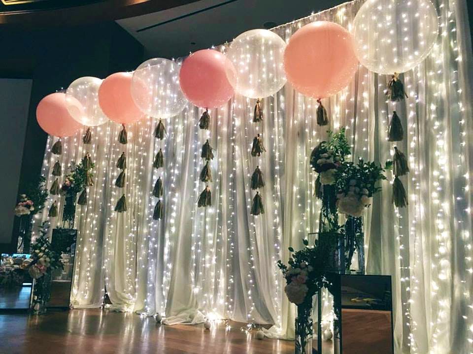 Balloon,Decoration,Party supply,Architecture,Lighting,Interior design,Ceiling,Arch,Toy,Curtain