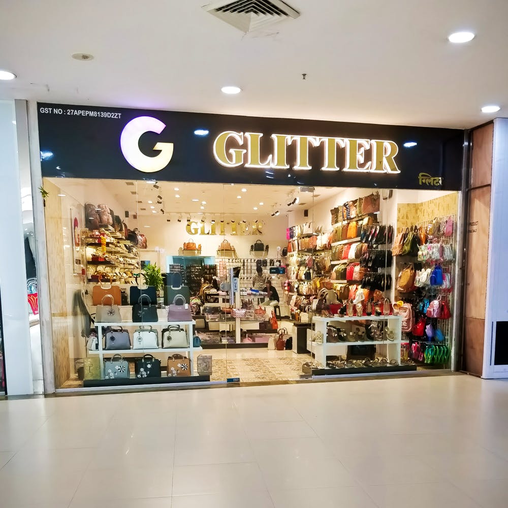 Outlet store,Building,Retail,Shopping mall,Boutique,Footwear,Interior design,Shopping,Fashion accessory,Shoe