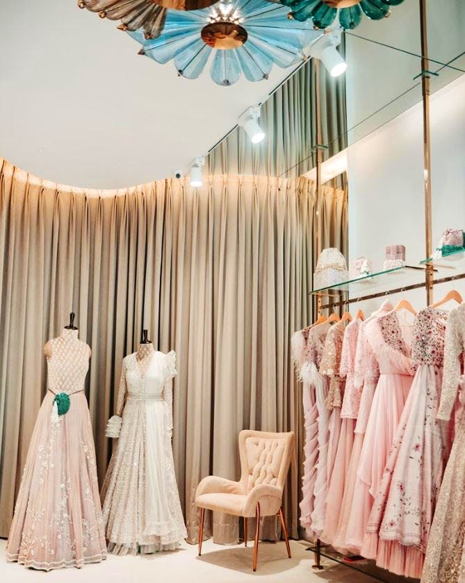 Pink,Curtain,Room,Dress,Interior design,Lighting,Ceiling,Furniture,Peach,Fashion