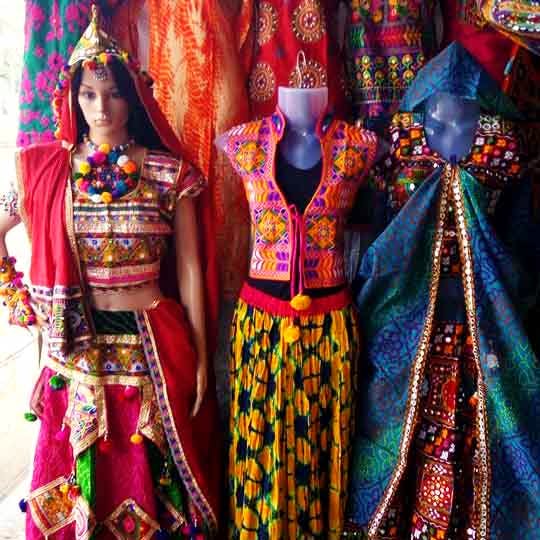 Clothing,Fashion,Textile,Dress,Tradition,Magenta,Formal wear,Sari,Fashion design,Art