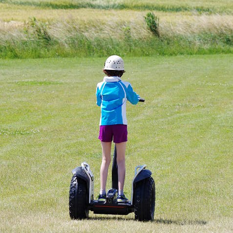 Segway,Vehicle,Grass,Grassland,Wheel,Fun,Automotive wheel system,Play,Recreation