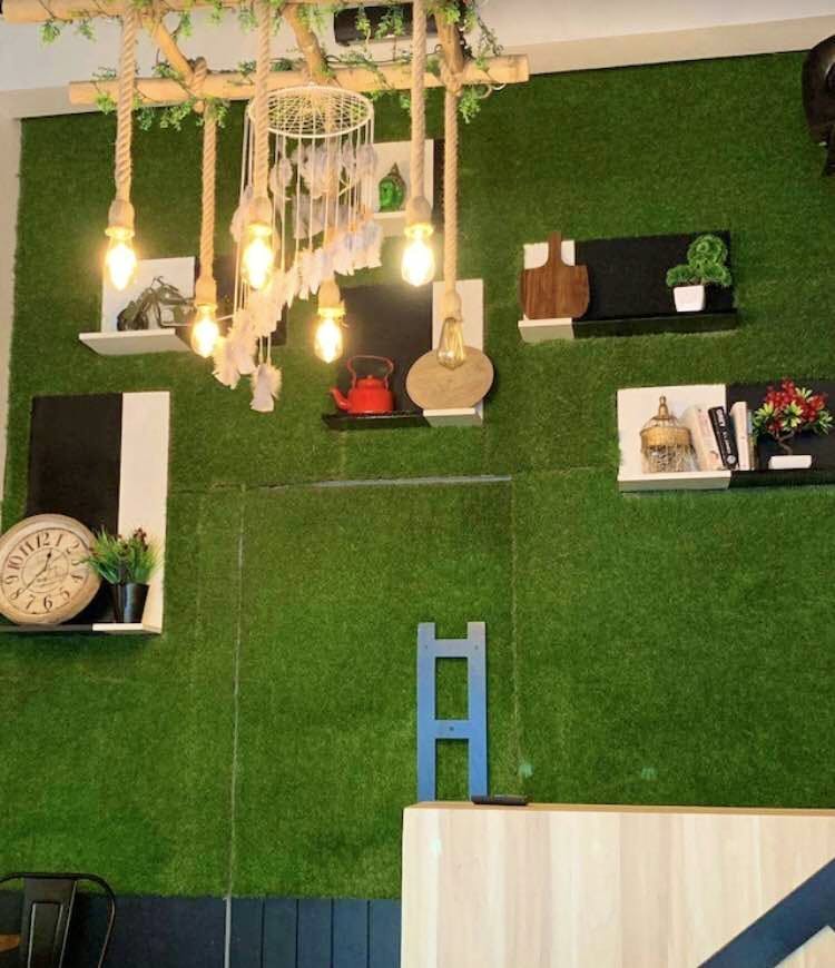 Grass,Scale model,Room,House,Artificial turf,Interior design,Table,Backyard,Lawn,Flooring