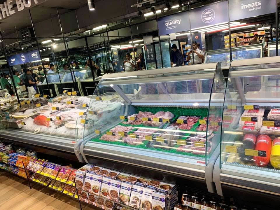Supermarket,Grocery store,Retail,Convenience store,Product,Building,Convenience food,Delicatessen,Display case,Grocer