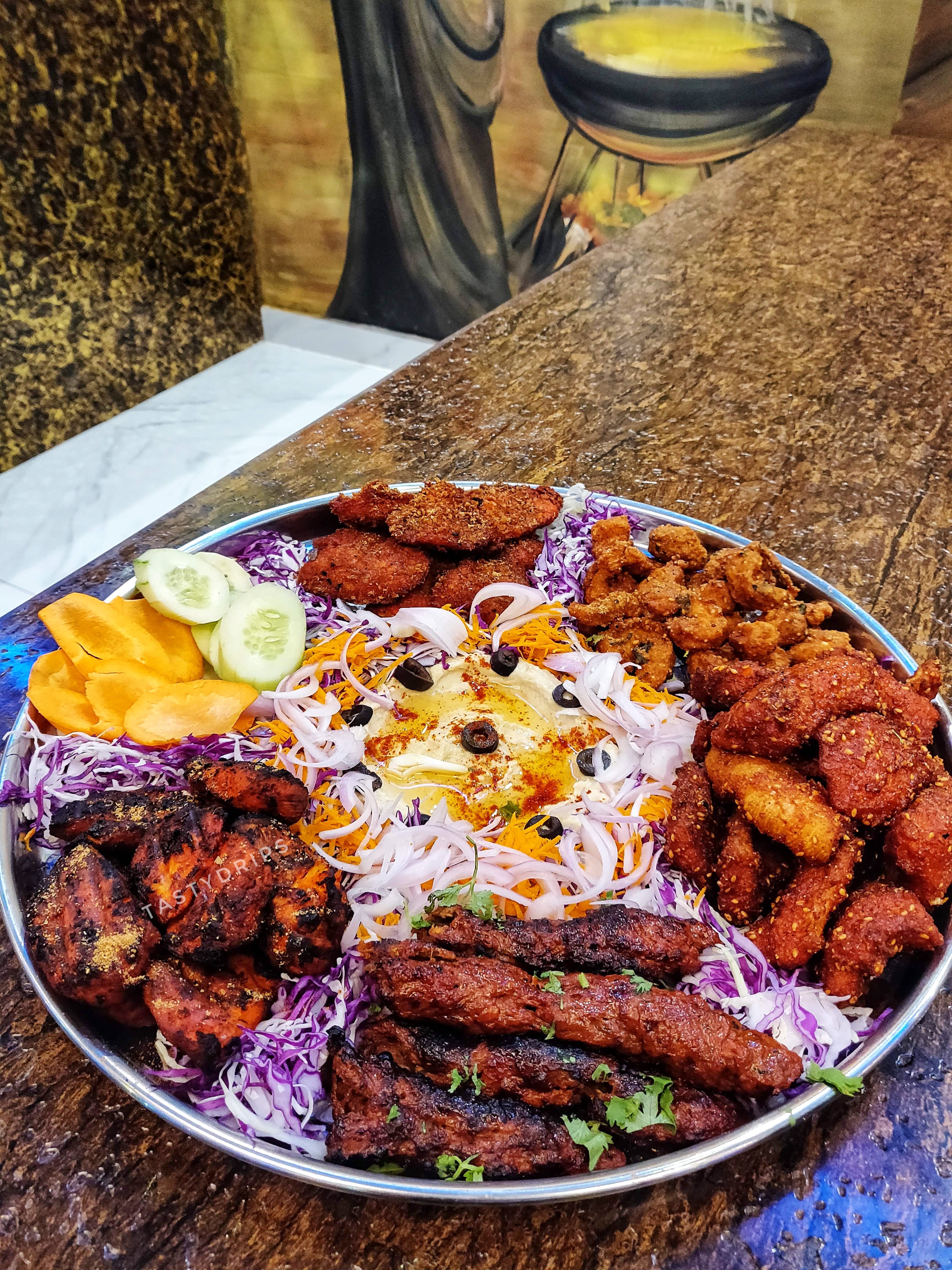 Dish,Food,Cuisine,Fried food,Ingredient,Meat,Produce,Mixed grill,Meal,Tandoori chicken