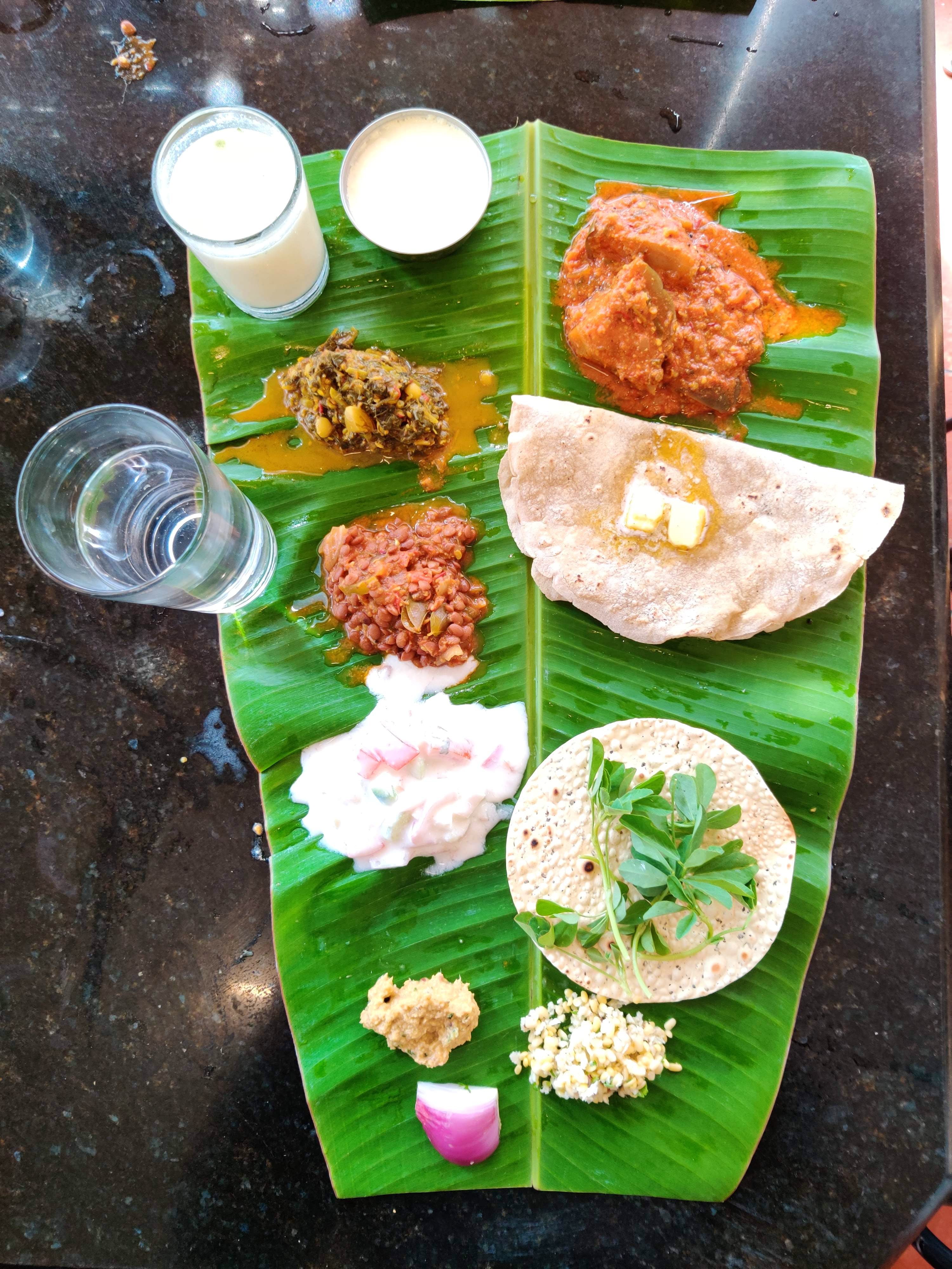 Dish,Food,Cuisine,Banana leaf,Ingredient,Banana leaf rice,Leaf,Sadya,Indian cuisine,Staple food