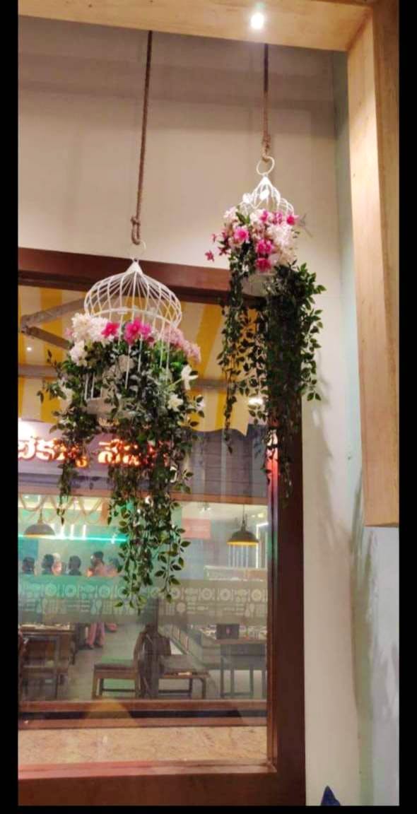 Houseplant,Flower,Floral design,Plant,Architecture,Interior design,Flower Arranging,Window,Glass,Floristry