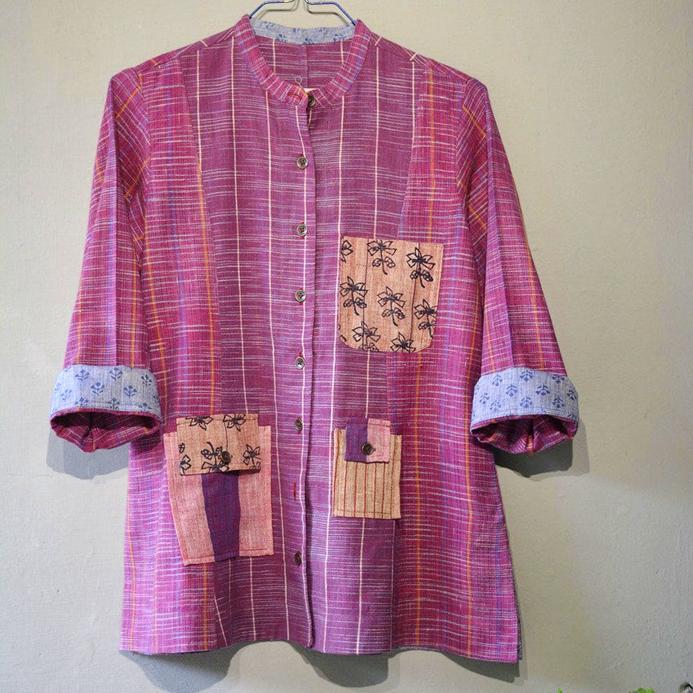 Clothing,Pink,Sleeve,Outerwear,Textile,Magenta,Clothes hanger,Pattern,Pattern,Plaid