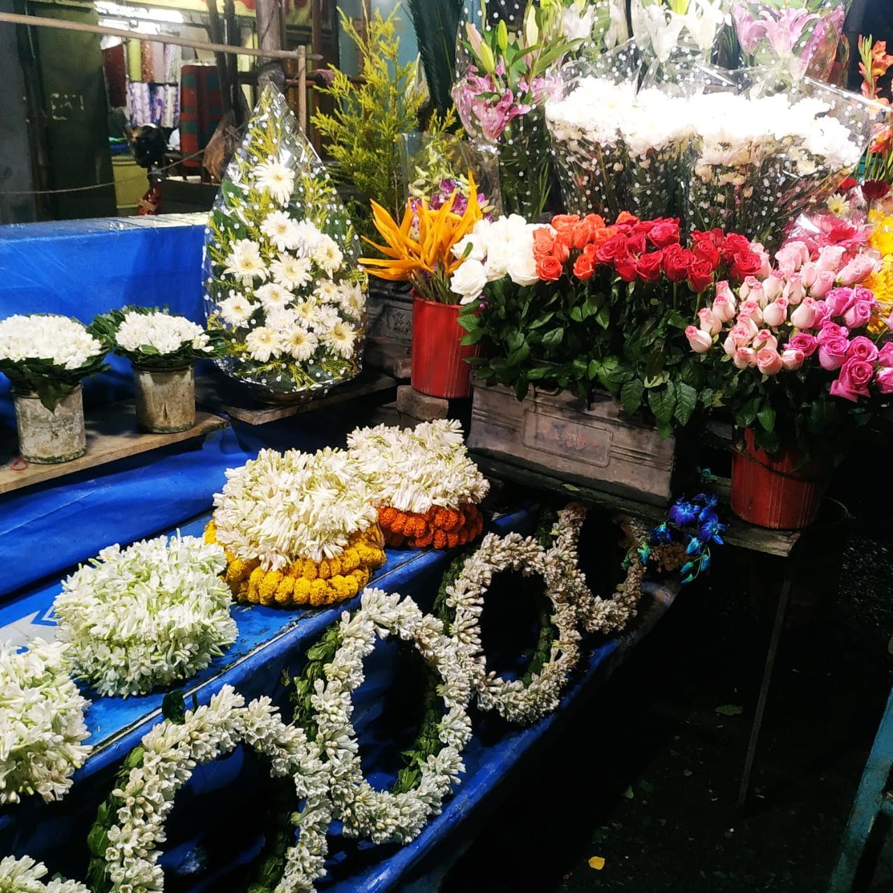 Bouquets Roses for Sale at Florist`s Shop on Street Flower Market