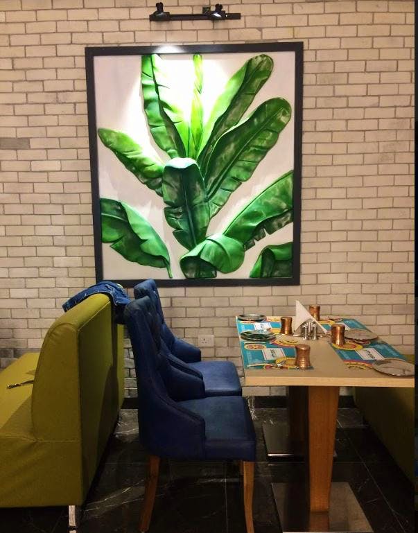 Green,Houseplant,Banana leaf,Leaf,Plant,Room,Interior design