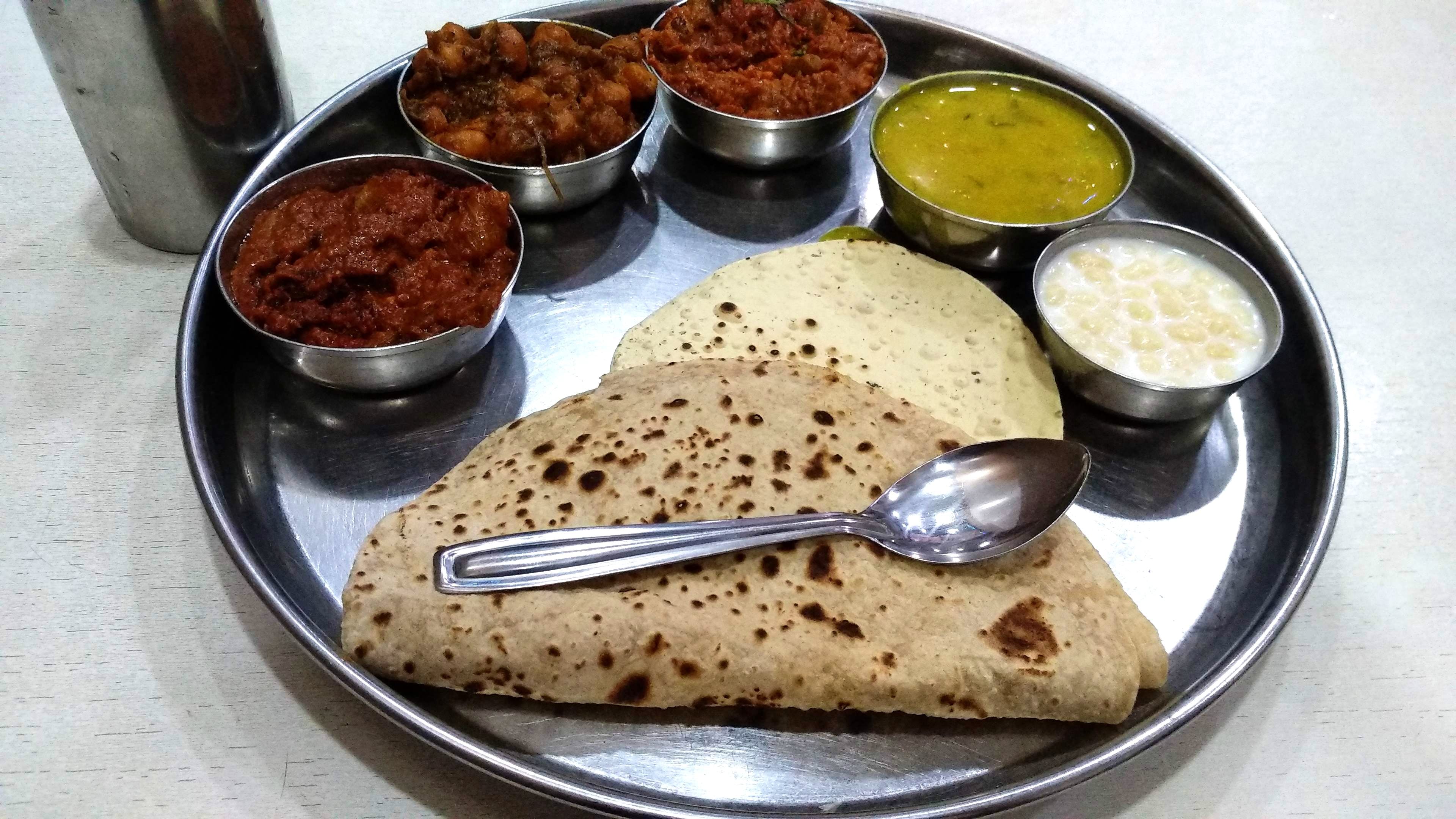 Dish,Food,Cuisine,Ingredient,Chapati,Indian cuisine,Punjabi cuisine,Staple food,Chutney,Roti