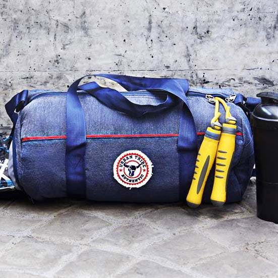 Bag,Duffel bag,Blue,Hand luggage,Luggage and bags,Baggage,Handbag,Design,Fashion accessory,Material property
