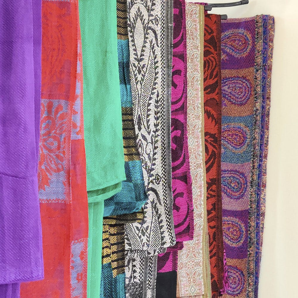 Turquoise,Stole,Textile,Magenta,Violet,Purple,Visual arts,Pattern,Motif,Woven fabric
