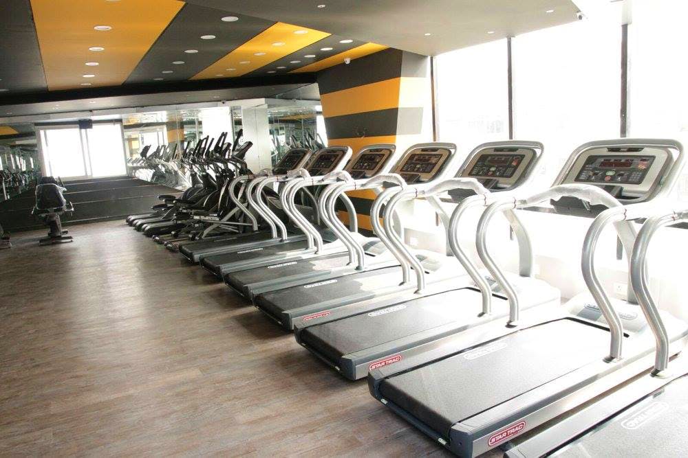 Treadmill,Gym,Exercise machine,Exercise equipment,Room,Sport venue,Leisure centre,Physical fitness,Sports equipment,Floor
