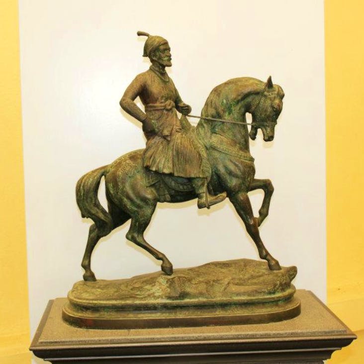 Sculpture,Statue,Bronze sculpture,Figurine,Art,Classical sculpture,Monument,Horse trainer,Bronze,Metal