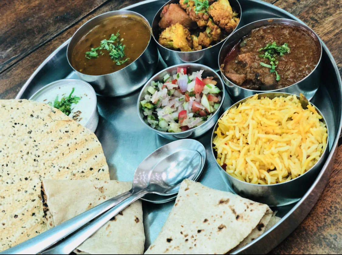 Dish,Food,Cuisine,Naan,Ingredient,Meal,Chapati,Punjabi cuisine,Raita,Indian cuisine