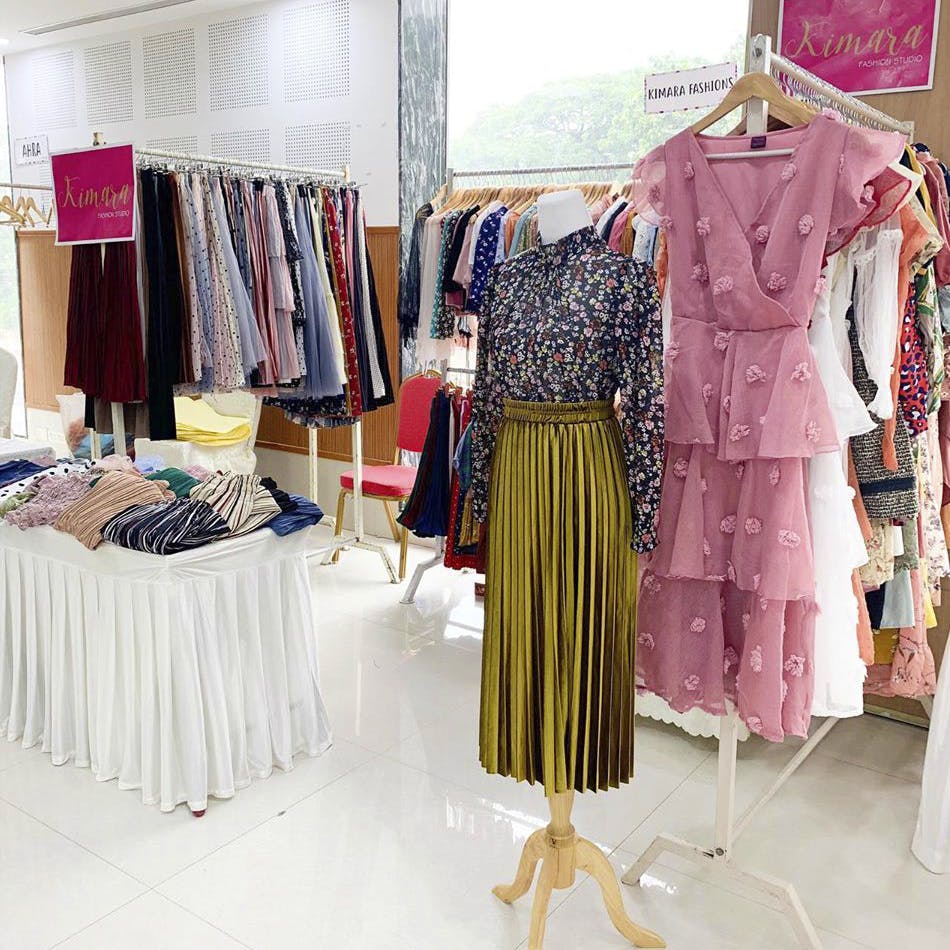 Boutique,Clothing,Dress,Pink,Fashion,Clothes hanger,Room,Retail,Vintage clothing,Fashion design