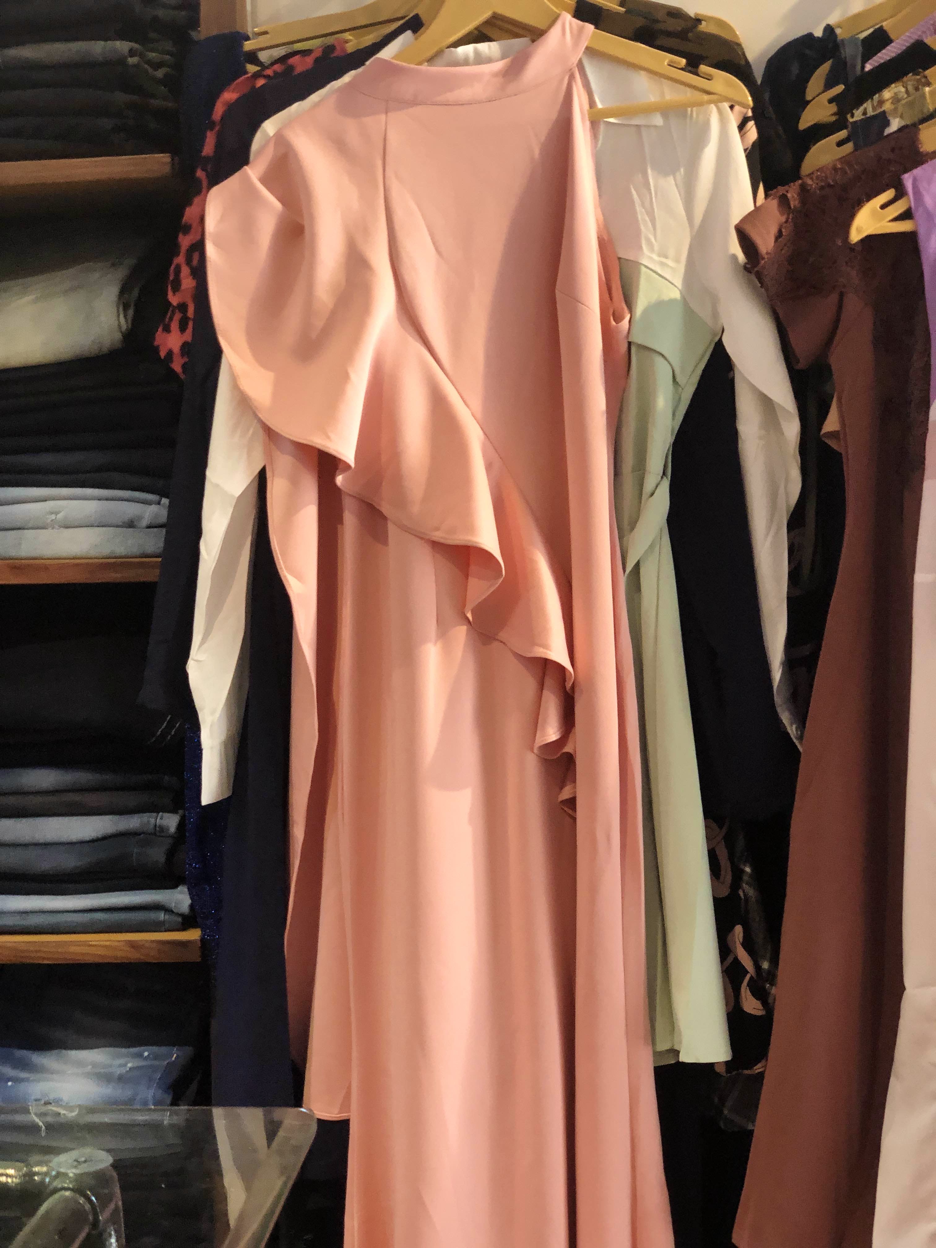 Clothing,Pink,Peach,Dress,Fashion,Boutique,Room,Clothes hanger,Outerwear,Technology