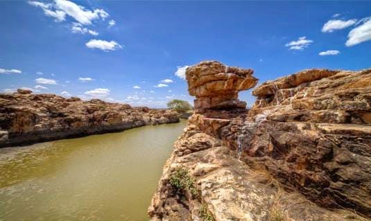 Natural landscape,Nature,Water resources,Rock,Formation,River,Nature reserve,Waterway,Outcrop,Sky