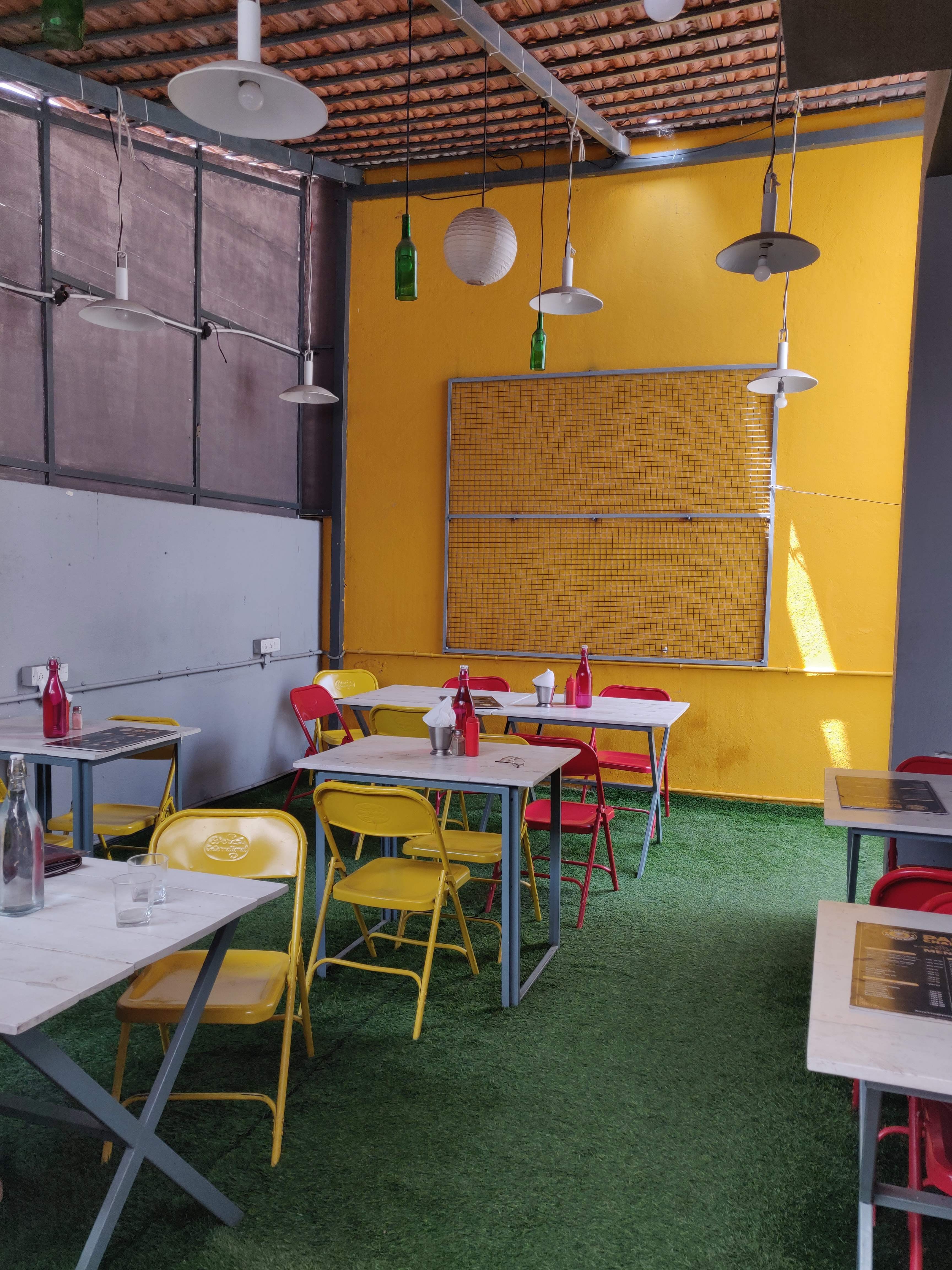 Room,Yellow,Table,Building,Furniture,Architecture,Interior design,House,Chair,Restaurant