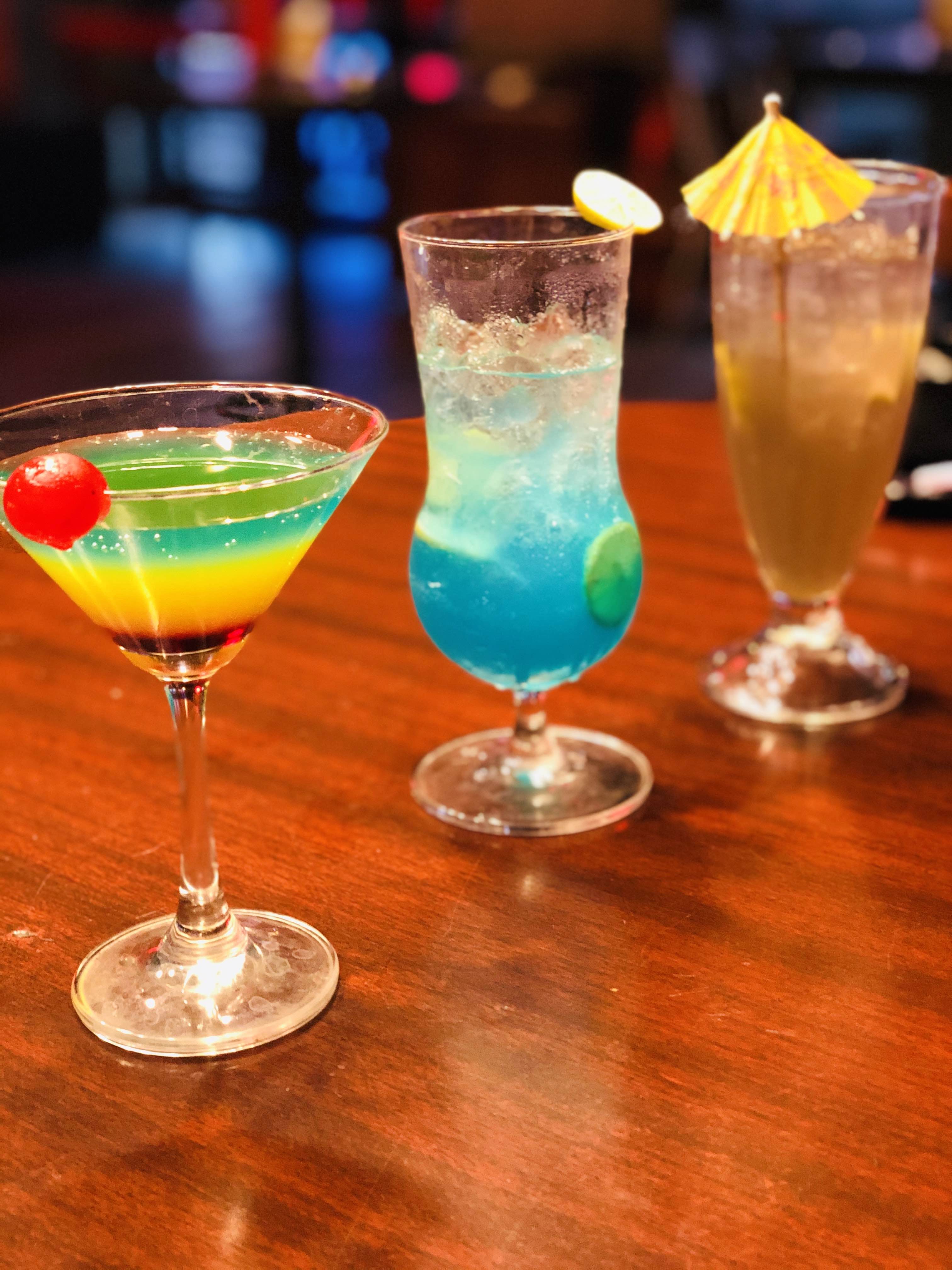 Alcoholic beverage,Drink,Cocktail garnish,Distilled beverage,Classic cocktail,Cocktail,Blue lagoon,Non-alcoholic beverage,Blue hawaii,Punch