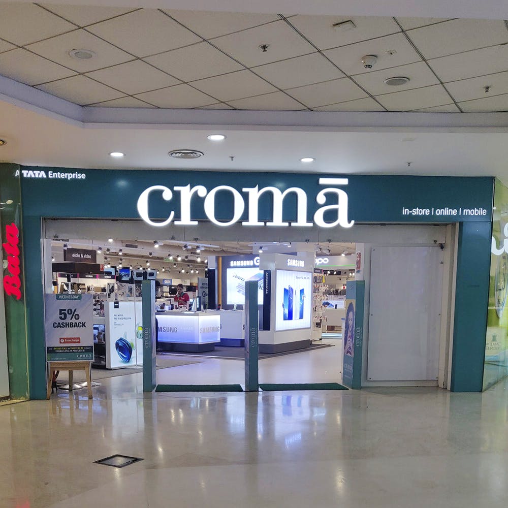 Building,Airport,Shopping mall,Outlet store,Door,Airport terminal,Retail,Interior design,Glass,Signage
