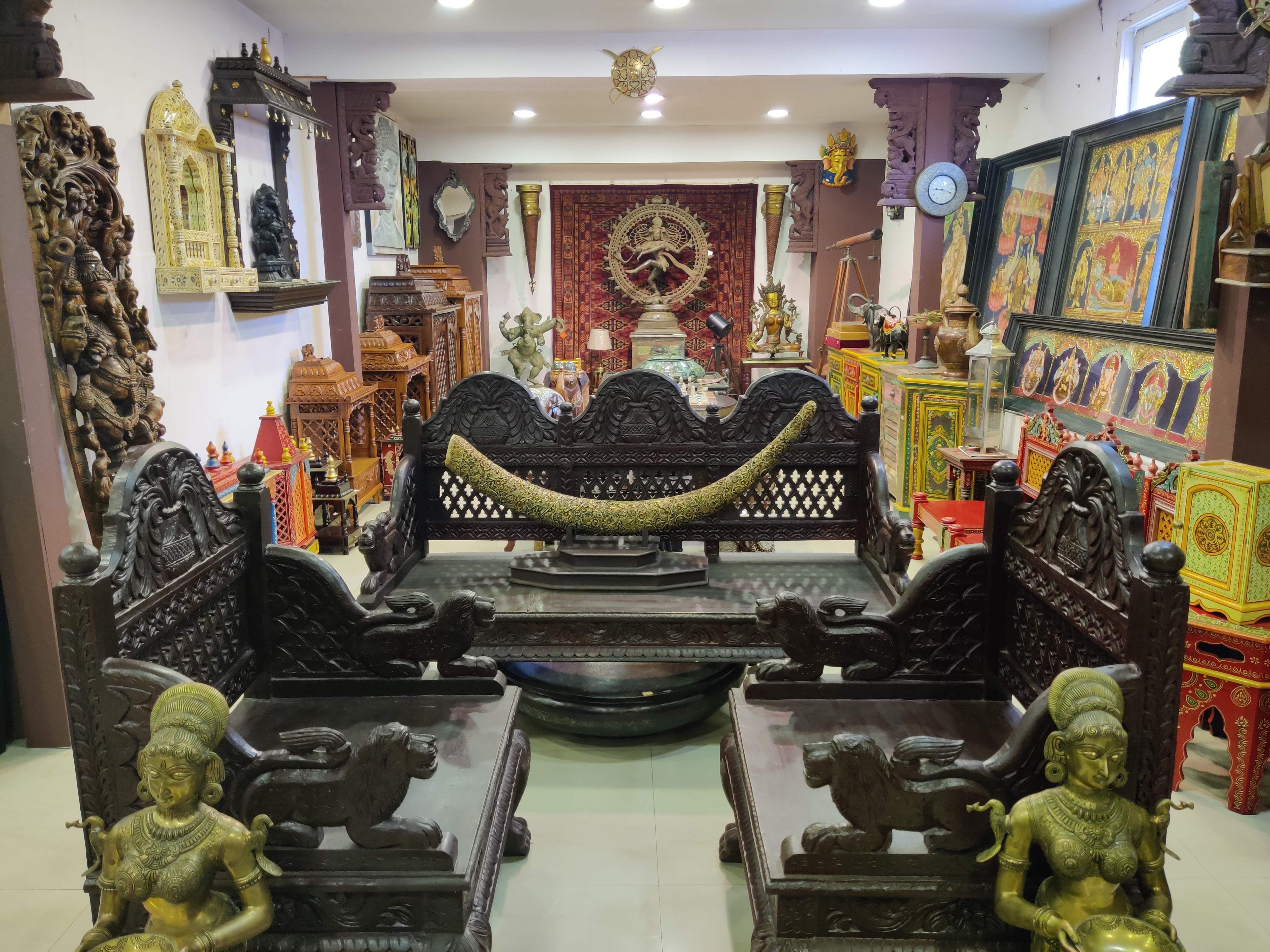 Furniture,Room,Chair,Building,Interior design,Architecture,Wat,Temple,Place of worship,Art