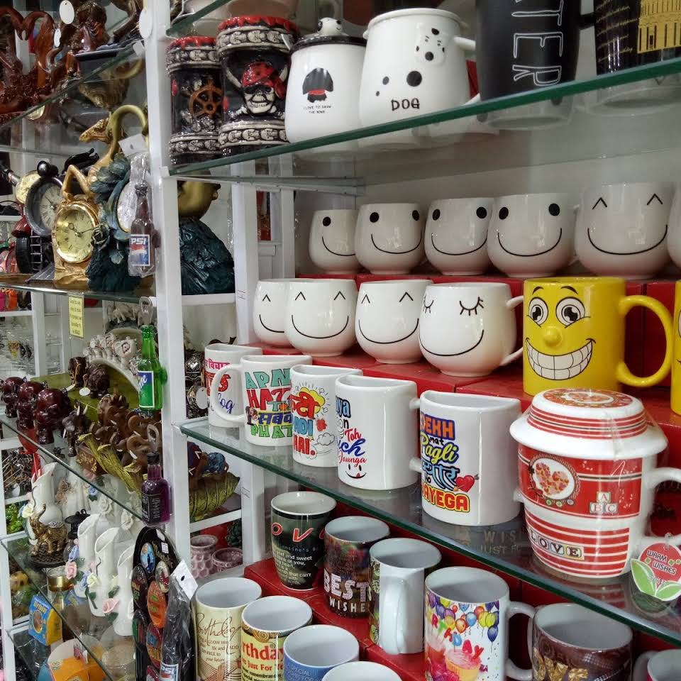 Collection,Ceramic,Shelf,Porcelain,Souvenir,Cup,Mug,Tableware,Coffee cup,Drinkware
