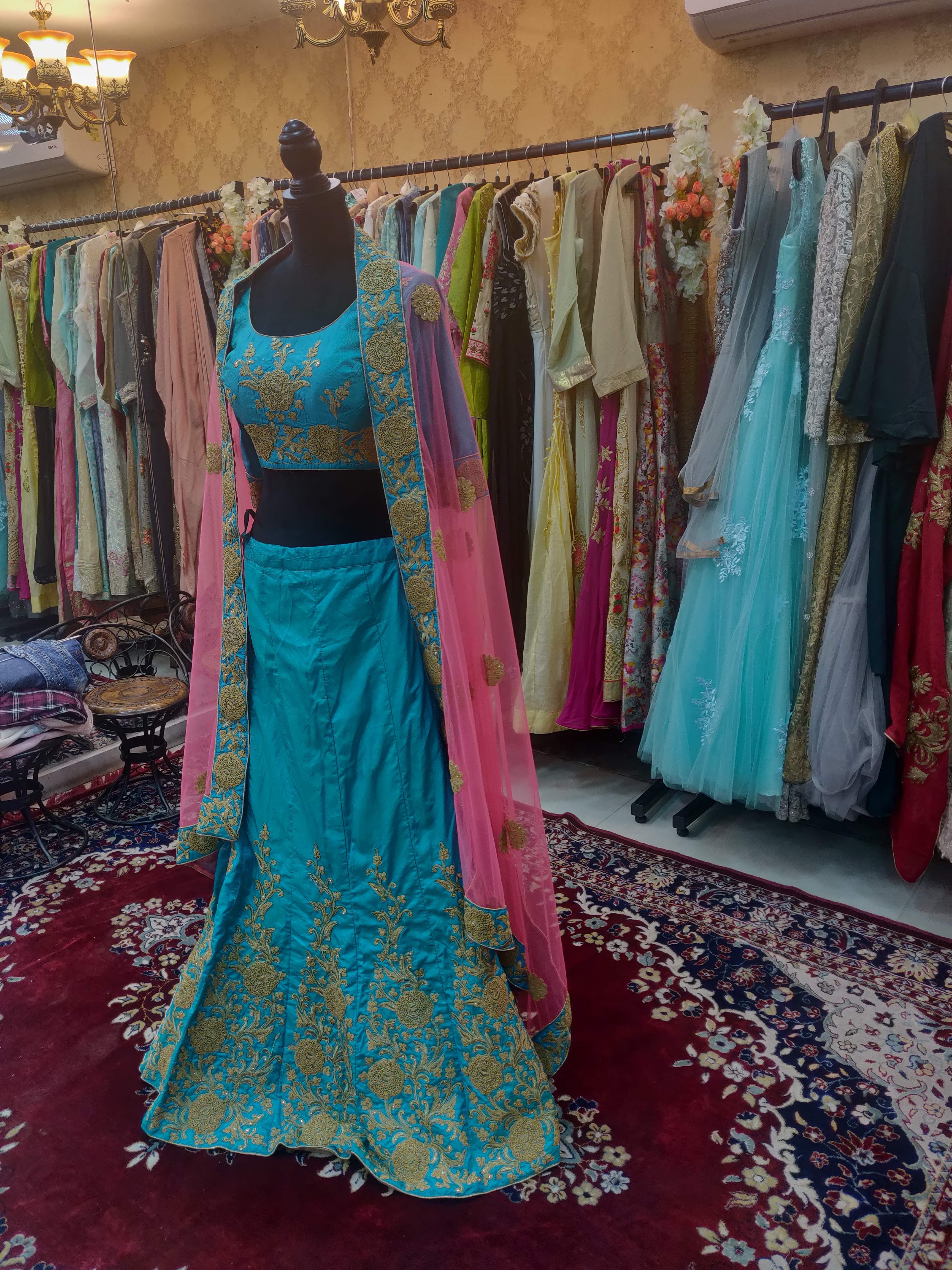 Clothing,Dress,Pink,Boutique,Sari,Textile,Formal wear,Magenta,Room,Fashion design