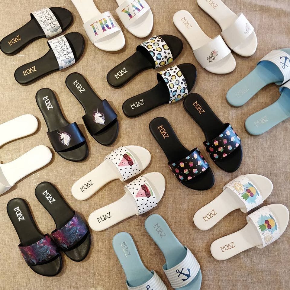 Footwear,Slipper,Product,Shoe,Font,Material property,Splint boots,Sandal,Brand,Flip-flops