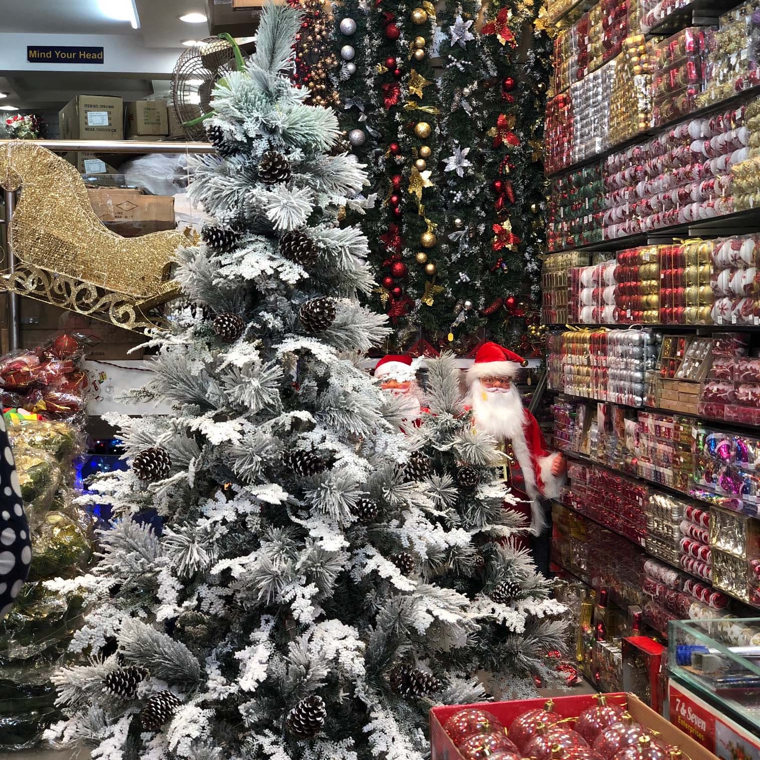 Christmas tree ornaments decorative material celebrating Christmas Festival  kept for sell in shop at Borivali Mumbai Stock Photo - Alamy