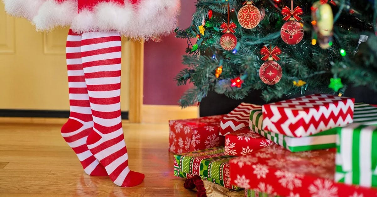 Christmas decoration,Christmas stocking,Christmas,Red,Interior design,Tree,Interior design,Holiday,Christmas tree,Room