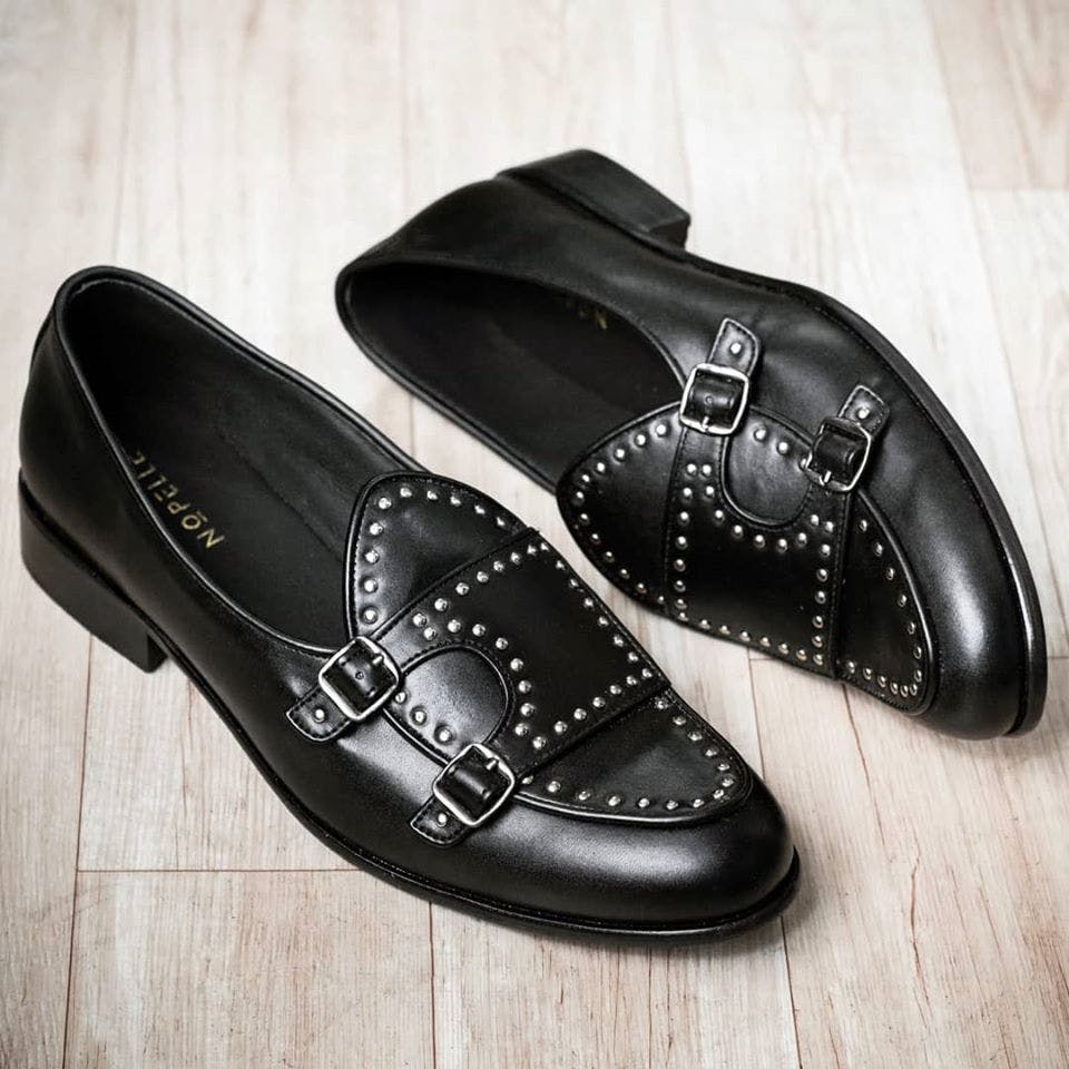 Footwear,Shoe,Black,Dress shoe,Font,Brand,Leather,Dancing shoe,Ballet flat,Oxford shoe